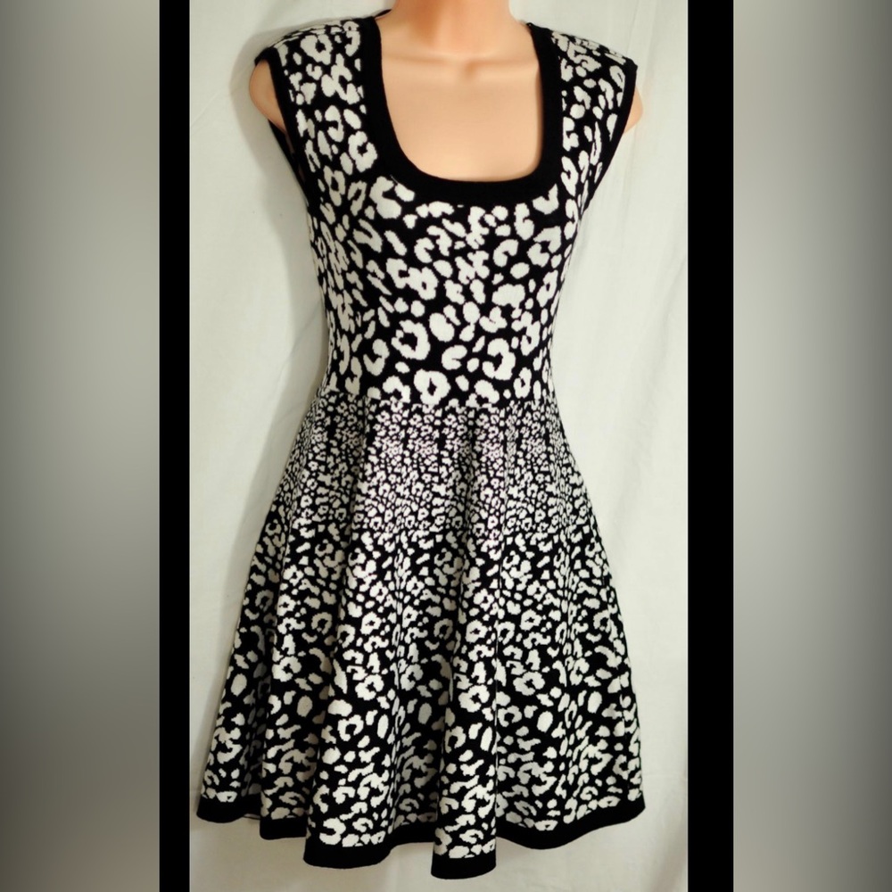 Black / White Leopard Print Dress. Length 35” approx. PTP 14” 1/2 Waist 13”